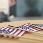 Image of USA flags on table